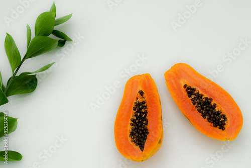 green backgrounds and papaya fruits