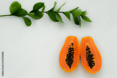 green backgrounds and papaya fruits