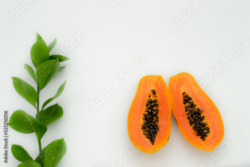 green backgrounds and papaya fruits