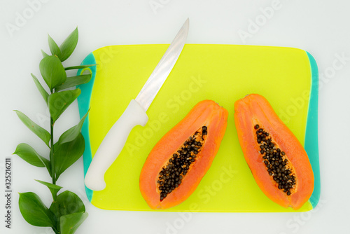 green backgrounds and papaya fruits