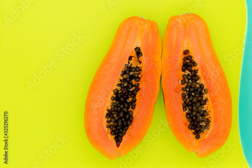 green backgrounds and papaya fruits