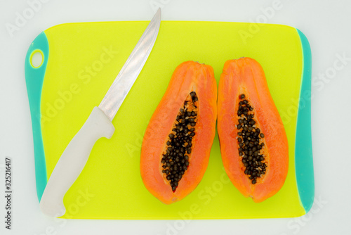 green backgrounds and papaya fruits