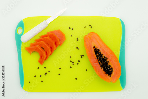 green backgrounds and papaya fruits