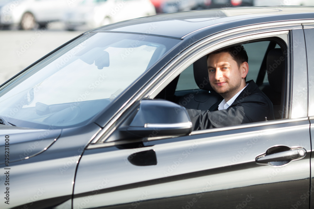 Young happy man bought new modern car. Young happy man bought new modern car.