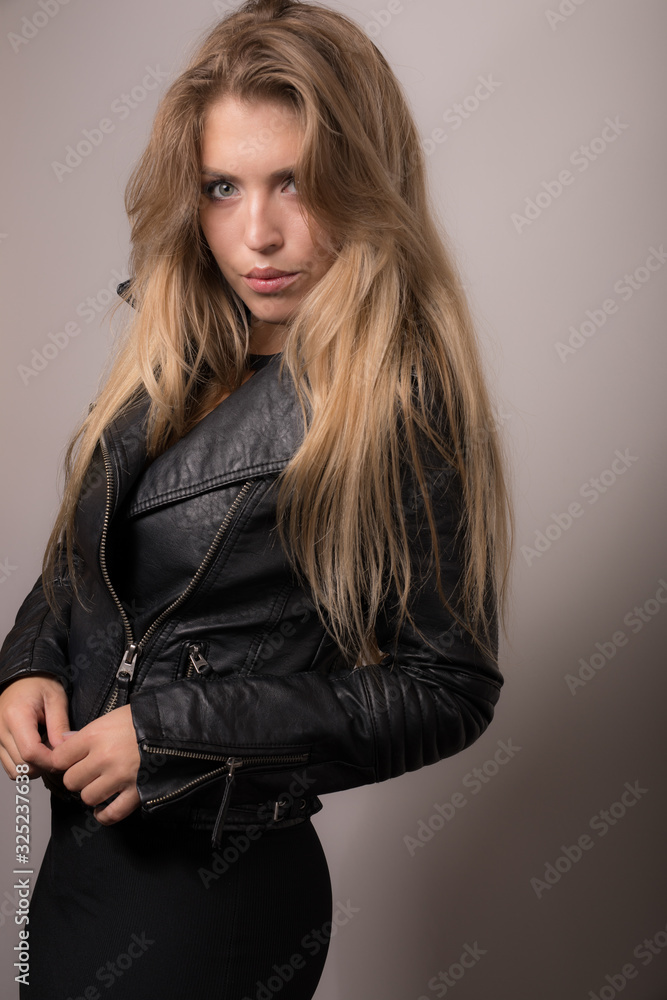 Young beautiful girl studio portrait. Young beautiful girl studio portrait.