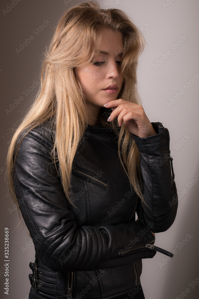 Young beautiful girl studio portrait. Young beautiful girl studio portrait.