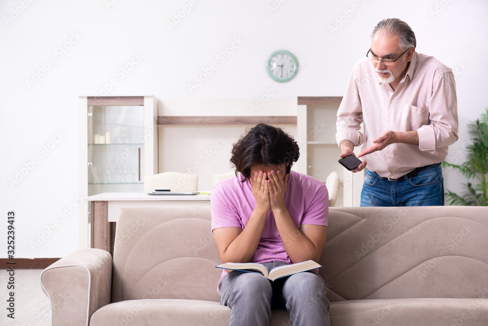 Young student and his father