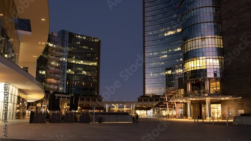 time lapse of sunrise in Gae Aulenti place, Milan, Italy photo