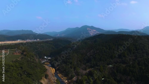 Aerial View Drone Flying Through Japanese Mountains photo