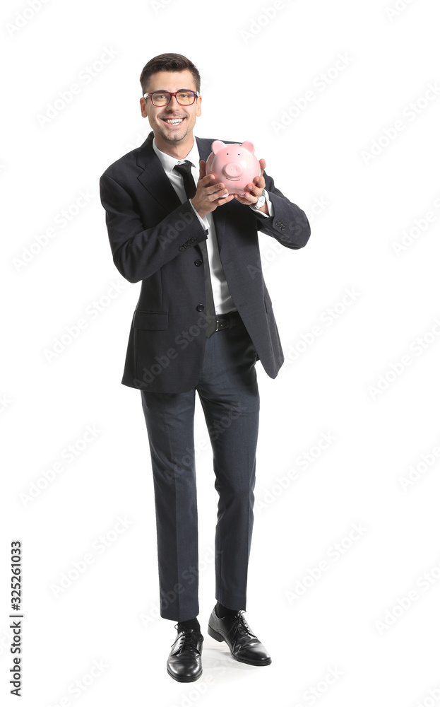Fototapeta premium Happy male bank manager with piggy bank on white background