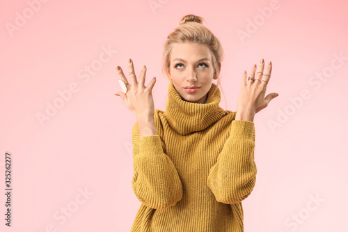 Young woman in warm sweater...