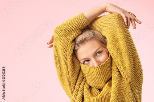 Young woman in warm sweater...