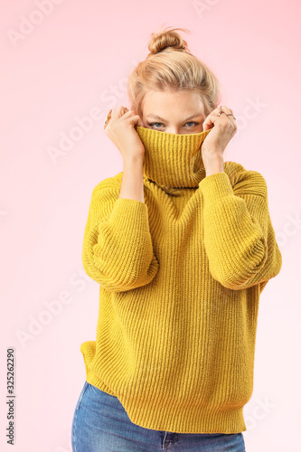 Young woman in warm sweater...