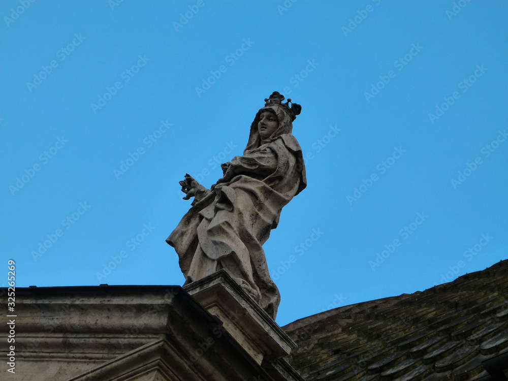 statue and the sky