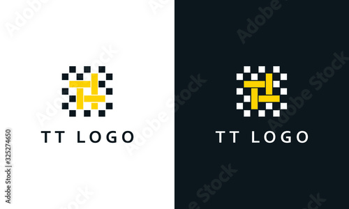 Minimalist elegant line art letter TT logo. This logo icon incorporate with two letter T and T in the creative way. photo