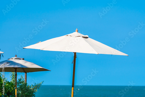 Umbrella and chair around beach sea ocean © siraphol