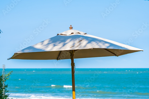 Umbrella and chair around beach sea ocean © siraphol
