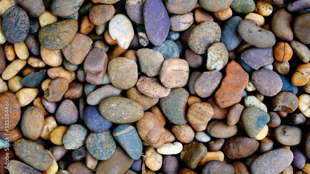 pebbles on the beach background. garden stone pebbles on the beach background. garden stone