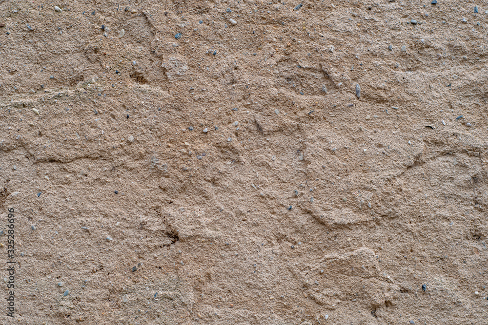 Background with dry, clay soil with small stones Background with dry, clay soil with small stones