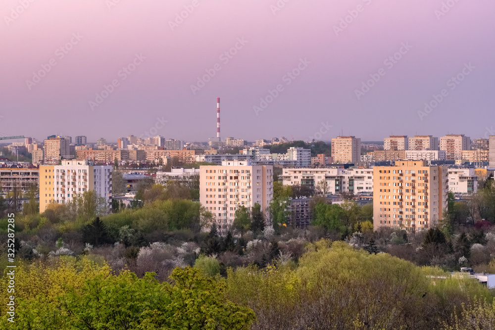 Warsaw cityscape with residential districts at twilight, Poland