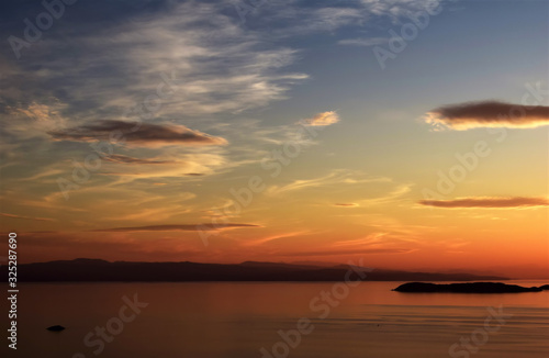 Sunset , sunset on the islands of the Aegean, Greece, SporadesGreece , Mediterranean Sea ,  Aegean sea  ,  Skiathos island  ,Skopelos island vacation in Greece . © ACHILLEFS