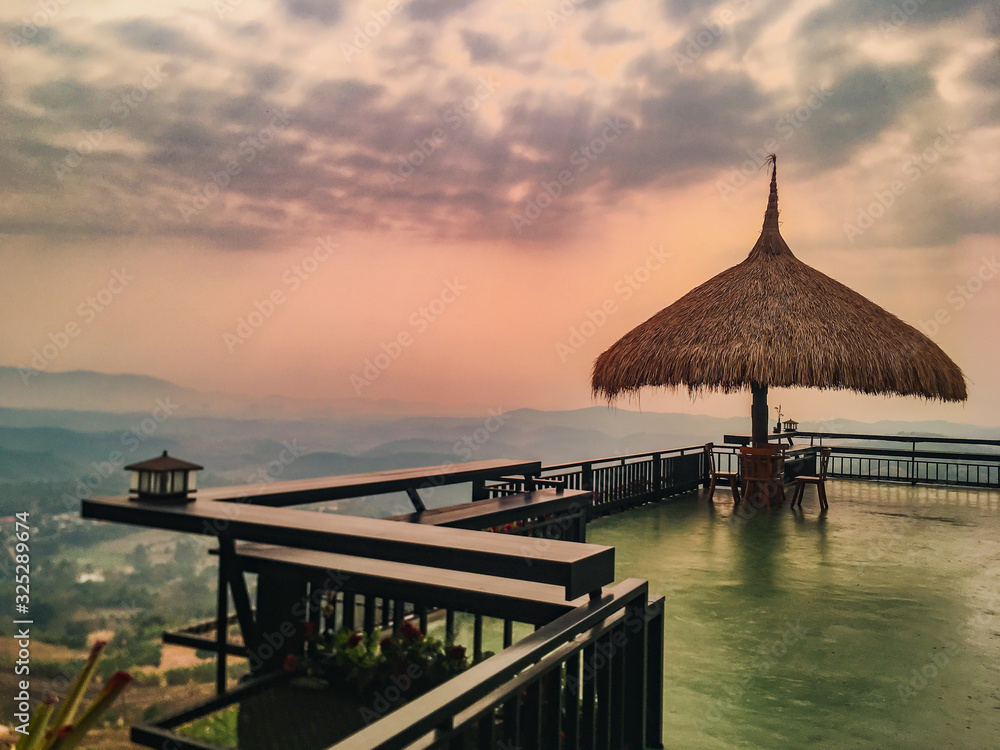 The landscape of mountains is full of clouds and fog. A top view of the haze in the mountains And fog in the morning at Doi Sako Mountain, Chiang Saen, Thailand.