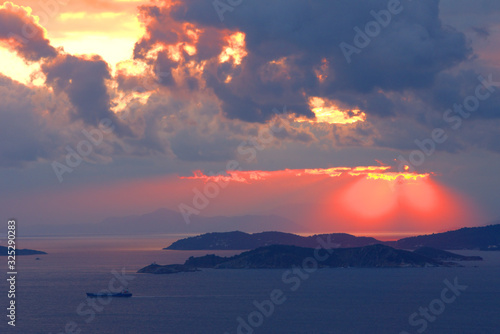 Sunset , sunset on the islands of the Aegean, Greece, SporadesGreece , Mediterranean Sea , Aegean sea , Skiathos island ,Skopelos island vacation in Greece .