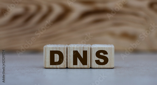 concept word DNS on cubes on a beautiful wooden background