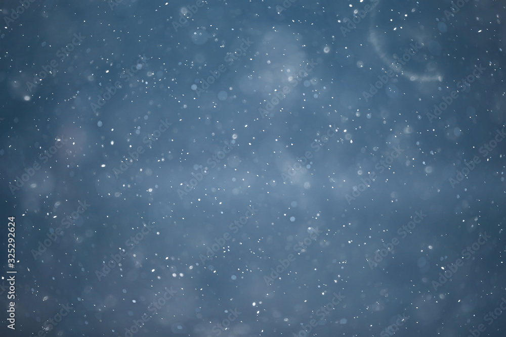 blue snowfall bokeh background, abstract snowflake background on blurred abstract blue blue snowfall bokeh background, abstract snowflake background on blurred abstract blue