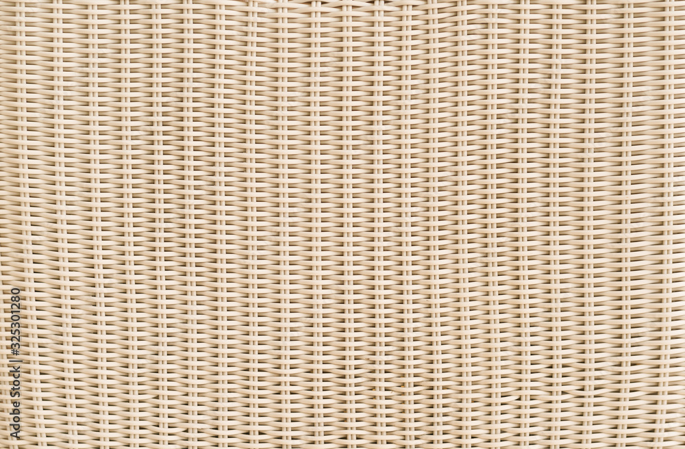 Rattan chair. A closed up background texture of a woven rattan chair. Rattan chair. A closed up background texture of a woven rattan chair.