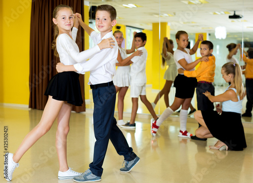 Fototapeta Naklejka Na Ścianę i Meble -  Children studying of partner dance