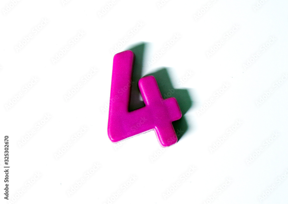 The number 4 is isolated on a white background with a shadow. Figure 4 made of plastic. Template. Number. Count. Children. The number 4 is isolated on a white background with a shadow. Figure 4 made of plastic. Template. Number. Count. Children.