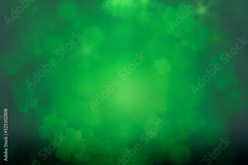 Photography ST Patrick's day green background clover leaf bokeh lights defocused for ST Patr