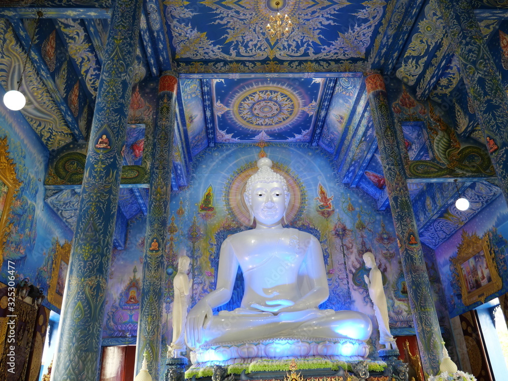 Obraz premium 2019: White Buddha in Blue Temple (Wat Rong Seur Ten), Chiang Rai. It is one of the most beautiful temples in Thailand and attract many tourists to visit the place.