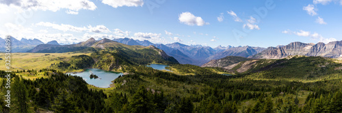 A breathtaking panorama of Sunshine Village, Canada, captures the stunning beauty of the Rocky Mountains.