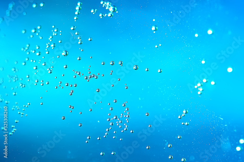 Wallpaper Mural air bubbles in water macro background / blue background abstract bubbles in water Torontodigital.ca