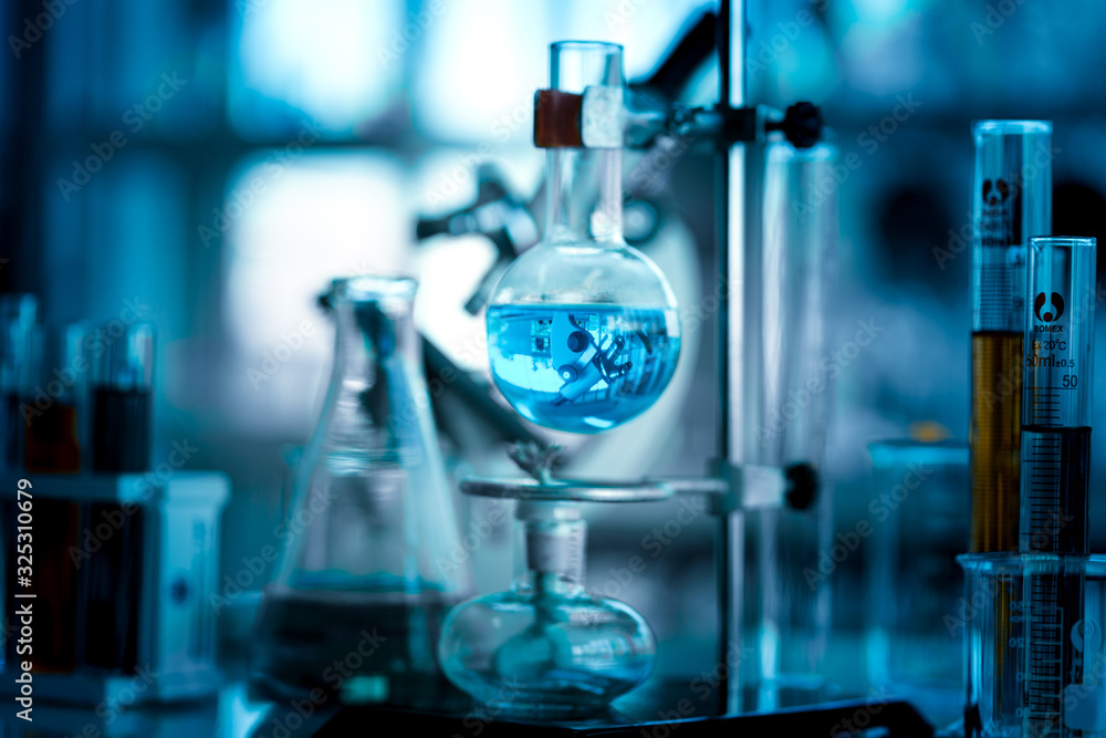Boiling liquid in round bottom flask in laboratory chemical research and development Boiling liquid in round bottom flask in laboratory chemical research and development