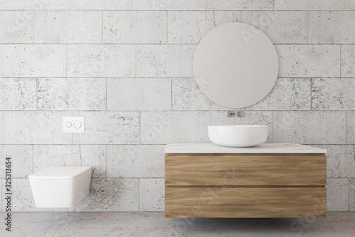 Photography Stone bathroom interior with sink and toilet