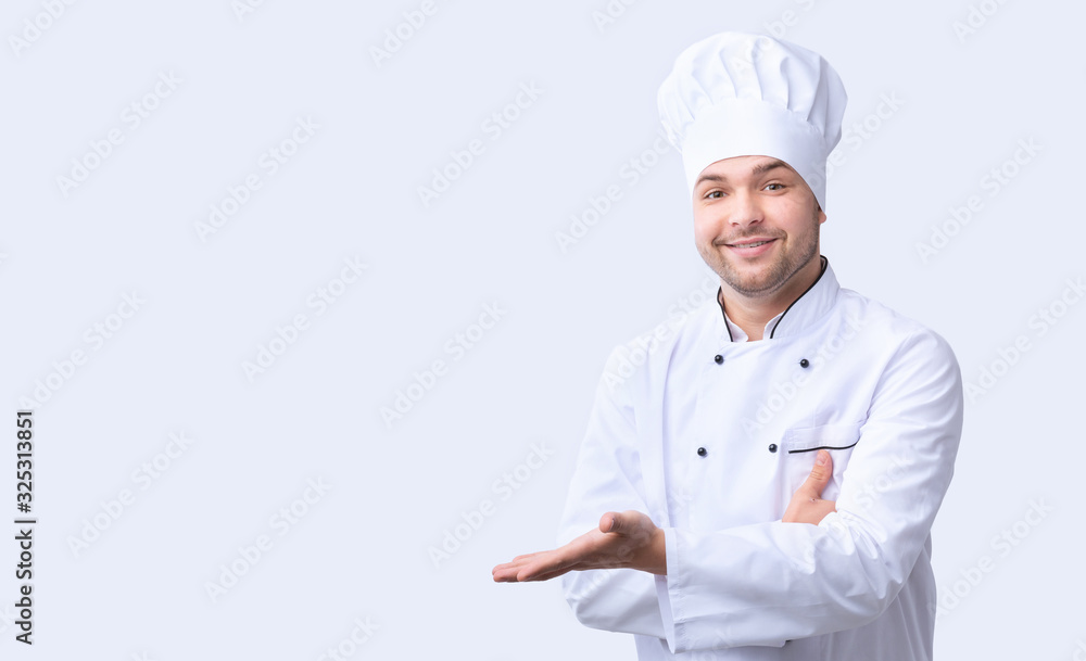 Chef Gesturing With Hand Pointing At Free Space, White Background