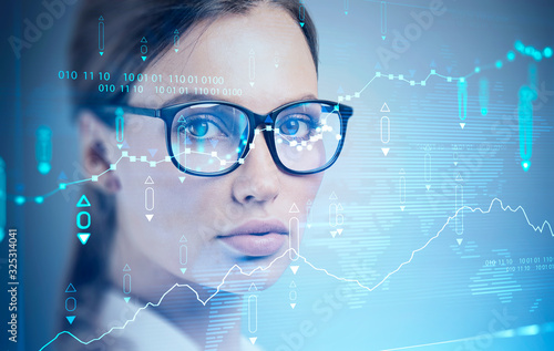 Businesswoman in glasses, financial chart