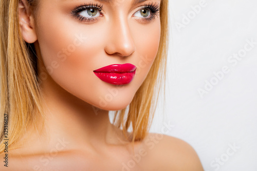 Sexy Red Lips closeup. Beauty Lips with Red Lipstick. Perfect Makeup. Young Woman close up.    
