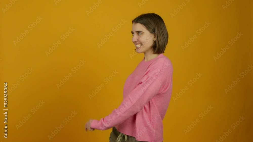 Excited girl dancing and accepting flowers with smile Excited girl dancing and accepting flowers with smile