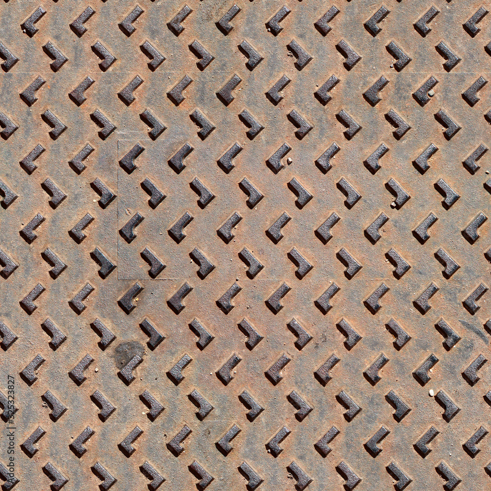 Seamless texture of rusty metal floor plate with bumped L shape pattern. Pisa. Italy. Seamless texture of rusty metal floor plate with bumped L shape pattern. Pisa. Italy.