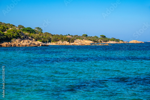 Panoramic view of the Costa Smeralda - Emerald Cost - seaside in Capriccioli beach tourist destination and resort at the Tyrrhenian Sea coast in Sassari region of Sardinia  Italy