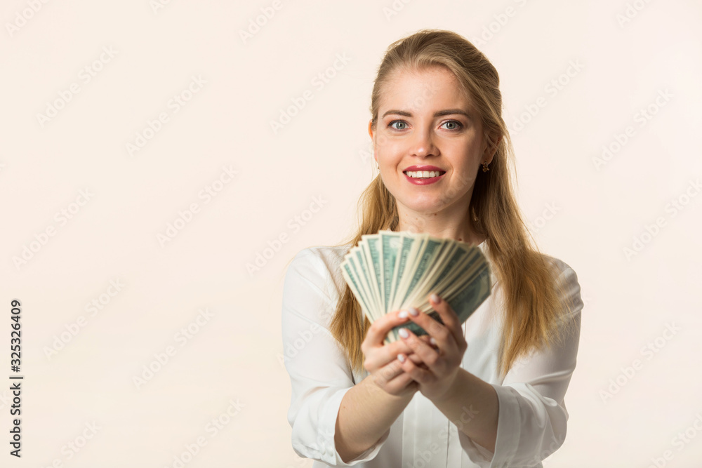 beautiful young woman with dollars in hands beautiful young woman with dollars in hands
