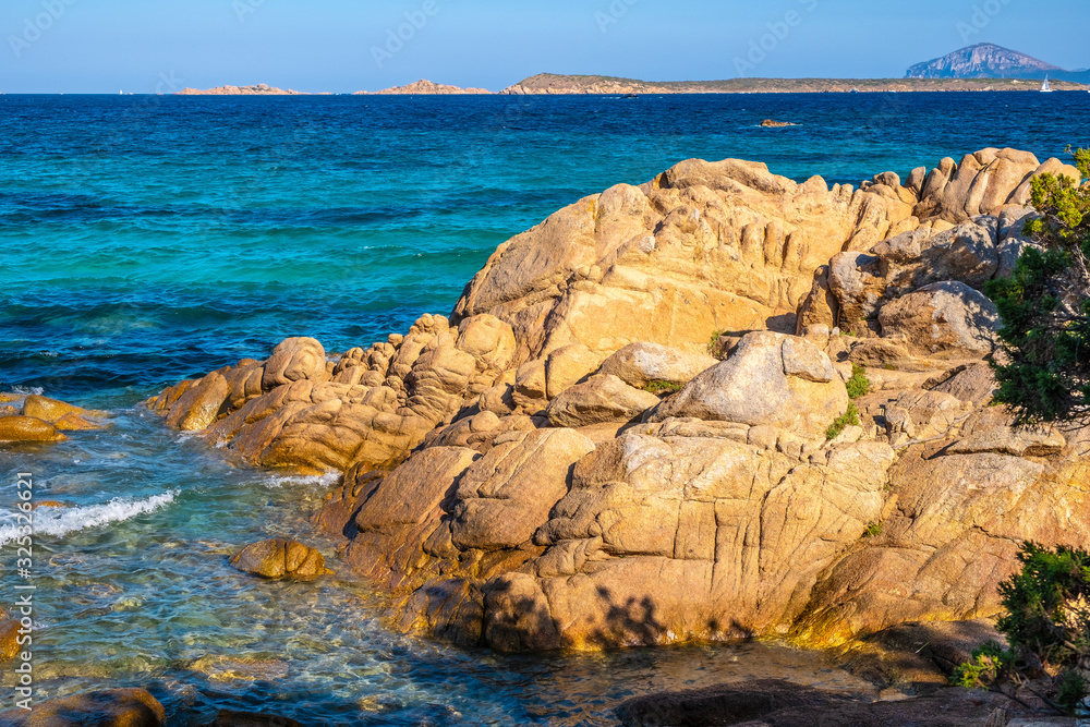 Fototapeta premium Panoramic view of the - Emerald Cost - seaside in Capriccioli beach tourist destination and resort at the Tyrrhenian Sea coast in Sassari region of Sardinia, Italy