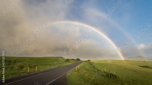 road to the rainbow over field and clouds in Hawaii © Francois DAVID