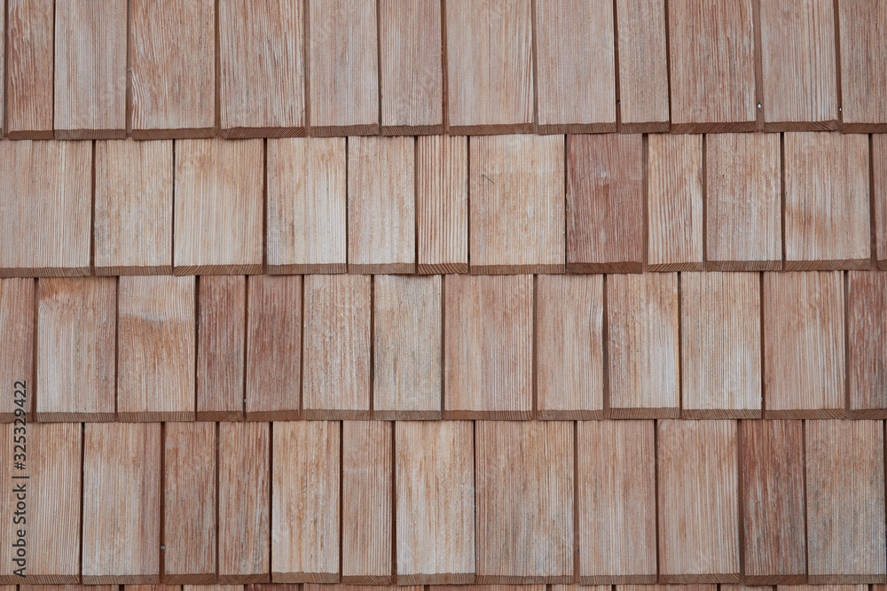 Details of aligned wood tiles or shingle background Details of aligned wood tiles or shingle background