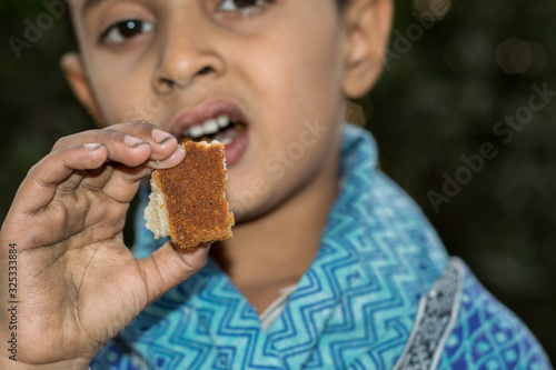 abandoned orphan boy very hungry in camp and his eyes are full of pain