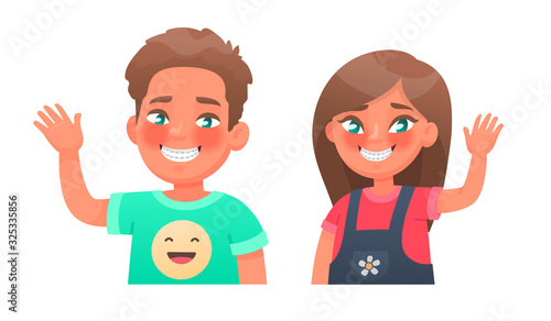 Happy boy and girl in braces on teeth. Teeth alignment, occlusion correction. Children with a beautiful smile